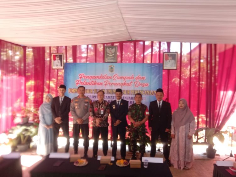 Babinsa Menghadiri Kegiatan Pengambilan Sumpah Dan Pelantikan Perangkat Desa Binaan 